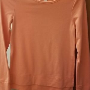 Pink long sleeved athletic shirt
